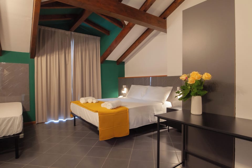 Superior Triple Room, Balcony | Desk, free WiFi