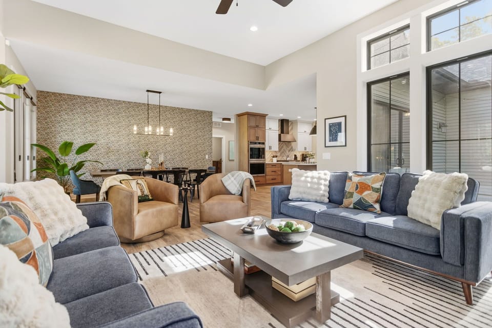 Main level living room with gas fireplace and 65" TV. Lots of seating!