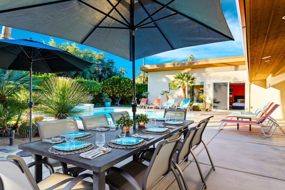 An inviting outdoor dining space for eight, perfect for alfresco meals and sunset gatherings.