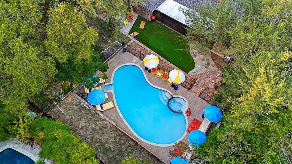 Your private paradise from above! Take in the full view of poolside fun, outdoor vibes, and endless relaxation.
