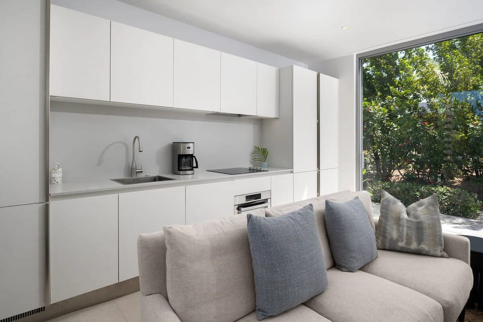 Prepare easy breakfasts in the sleek, minimalist kitchen space.