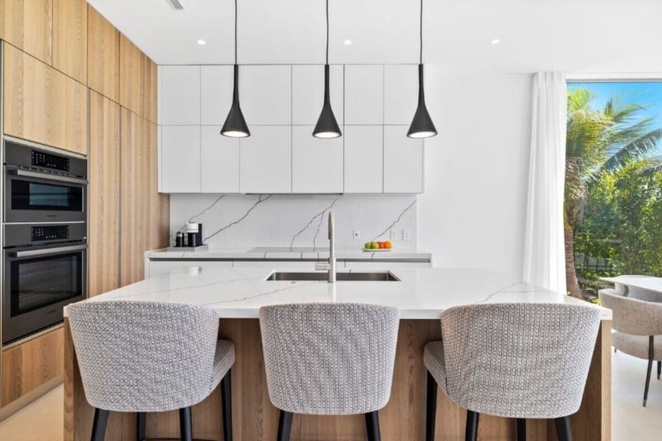 Create beachy breakfasts at the sleek island bar seating.