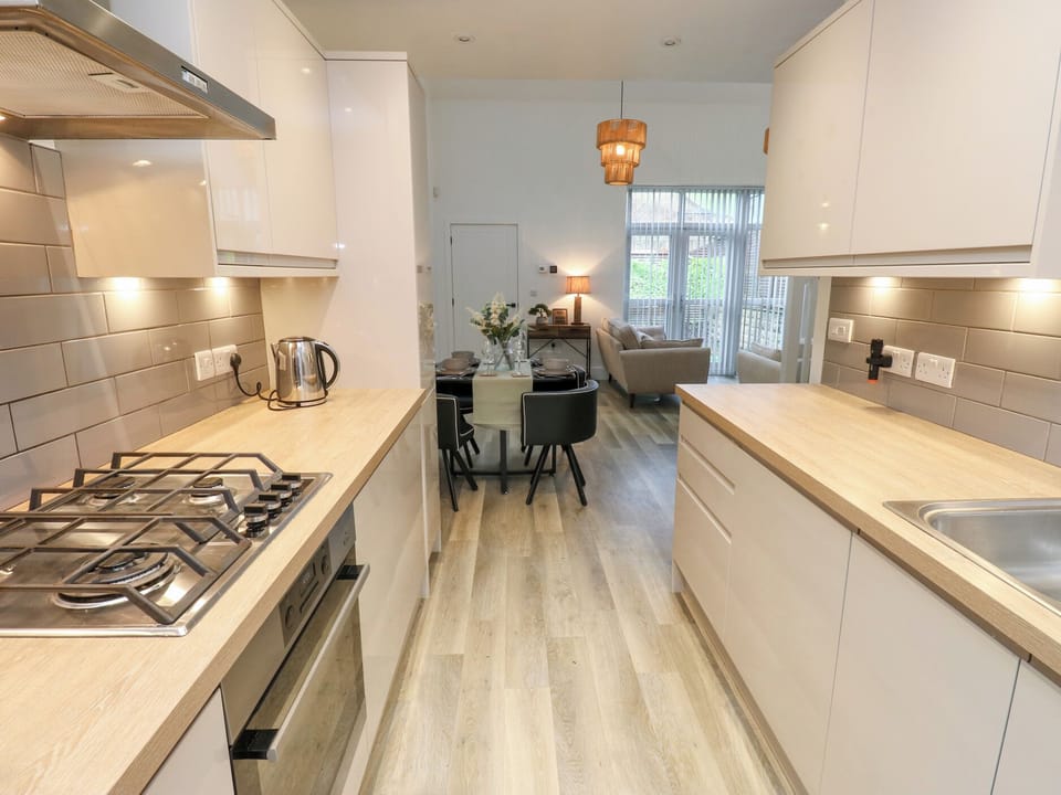 Fridge, microwave, dishwasher, cookware/dishes/utensils