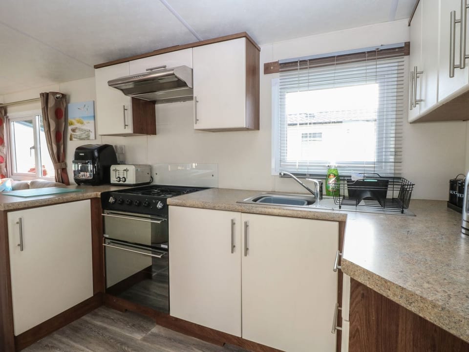Fridge, microwave, toaster, cookware/dishes/utensils