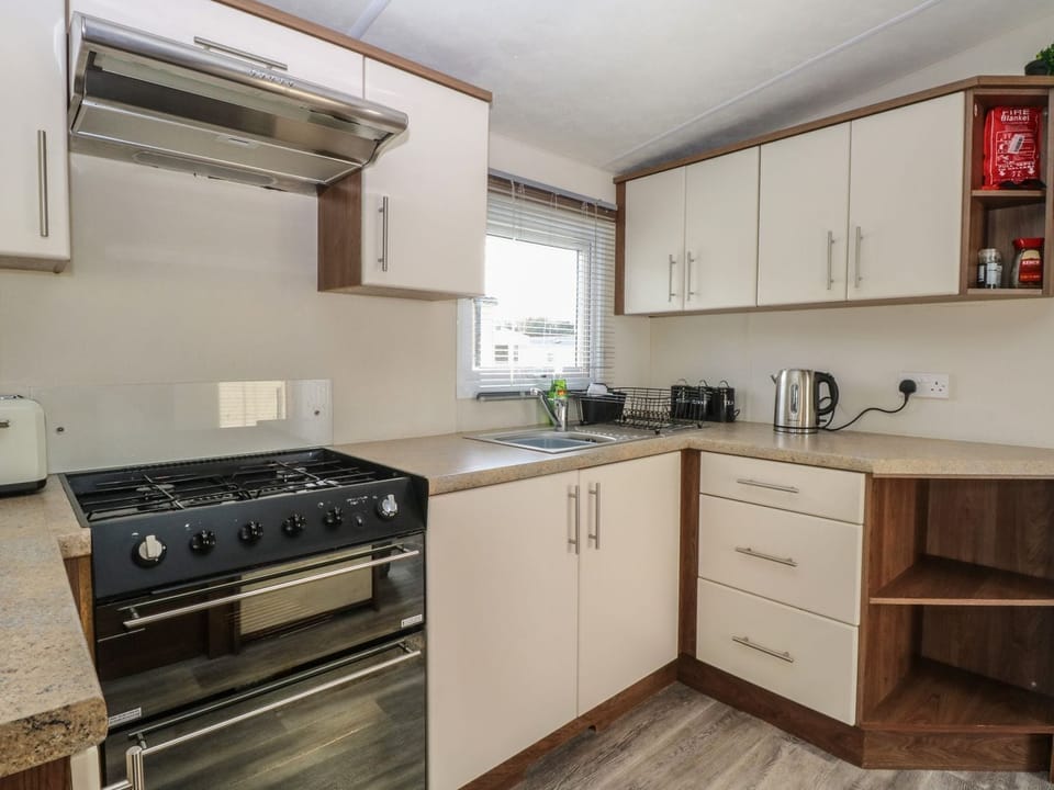 Fridge, microwave, toaster, cookware/dishes/utensils
