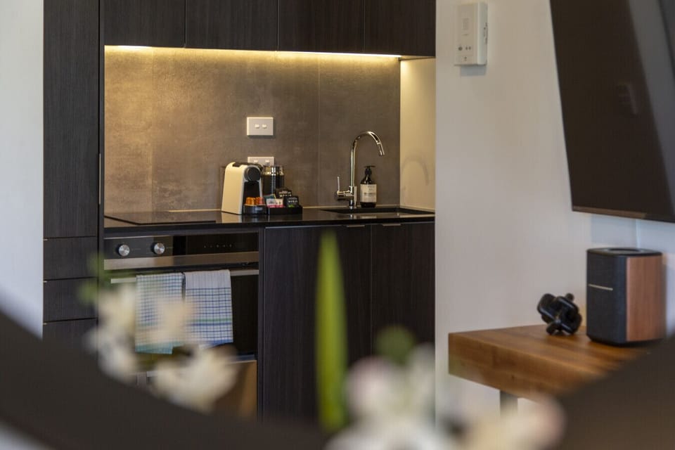 Modern kitchen with oven, dishwasher and stove