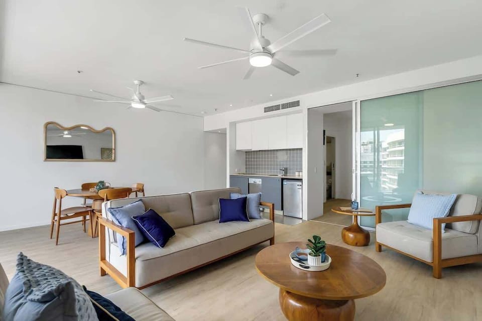 The living area offers a breezy, laid-back space to unwind, with comfortable seating and a Smart TV for easy downtime after exploring Cairns.