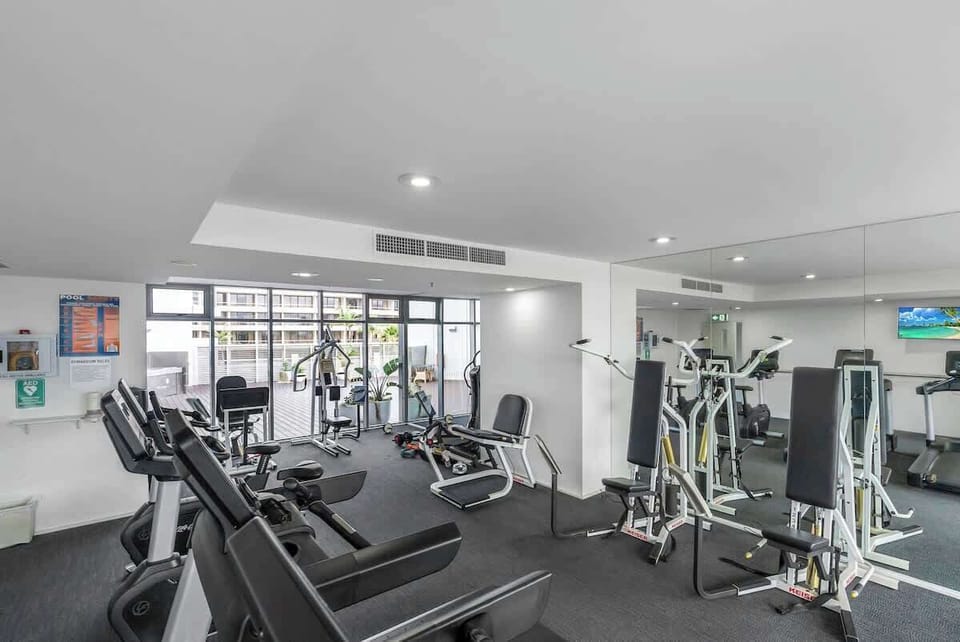 The shared gym’s natural light and full suite of cardio and strength equipment create an energising space to maintain wellness throughout your stay.