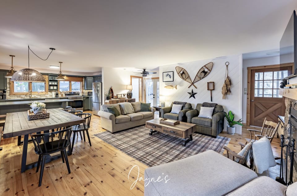 Spacious living room with cozy seating and rustic charm