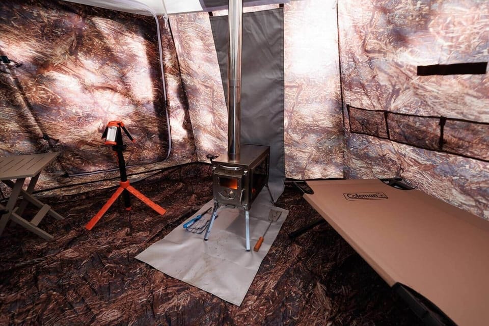 Wood stove, 2 cots, 2 camp chairs, LED Light