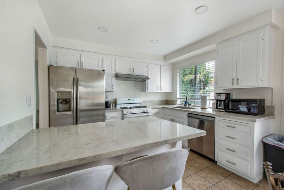 Cook up a storm in our fully equipped kitchen with a spacious island!