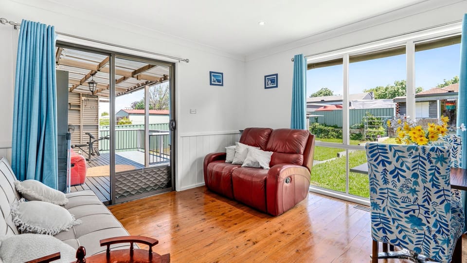 Living area with garden access and plenty of sunlight