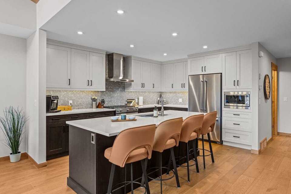 Kitchen, with bar seating
