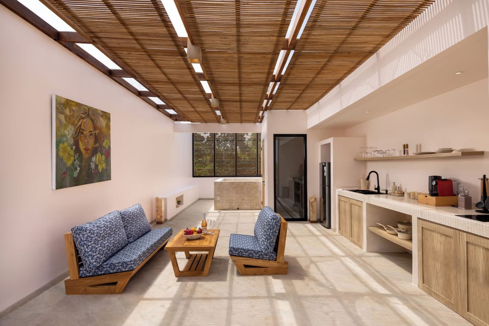 Luxury Duplex, 1 Bedroom, Ocean View | Living area | 21-inch TV with cable channels