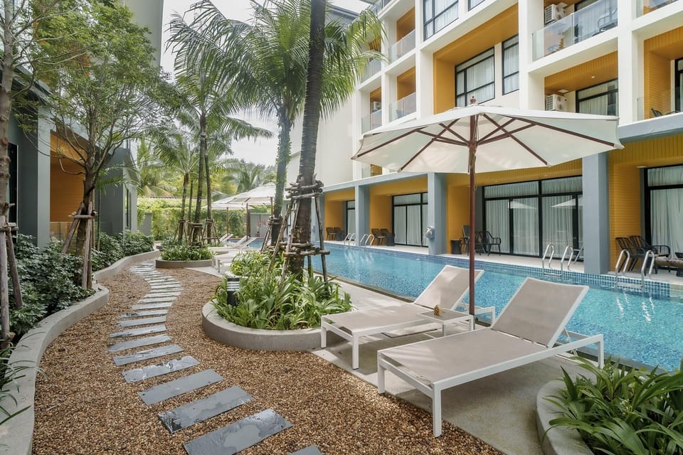 Complex Building, Swimming Pool, Sun Lounges