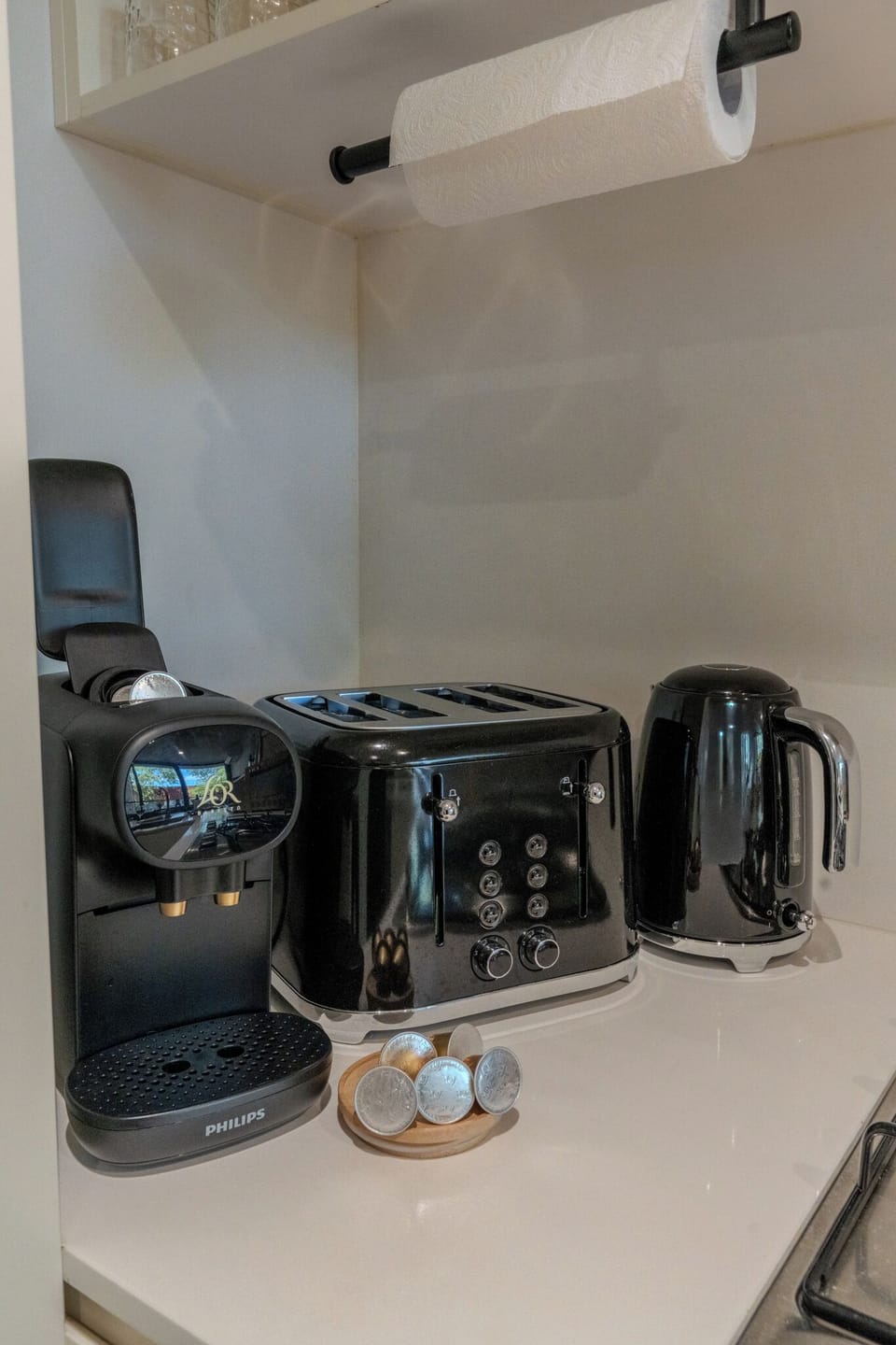 Sleek Nespresso machine with pods, ready to brew your perfect morning expresso.