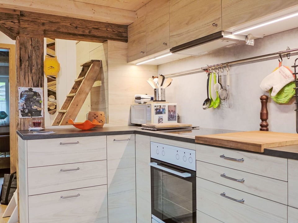 Kitchen, Countertop, Kitchen Appliance, Furniture, Wood, Interior Design, Flooring, Cabinetry, Major Appliance, Home Appliance