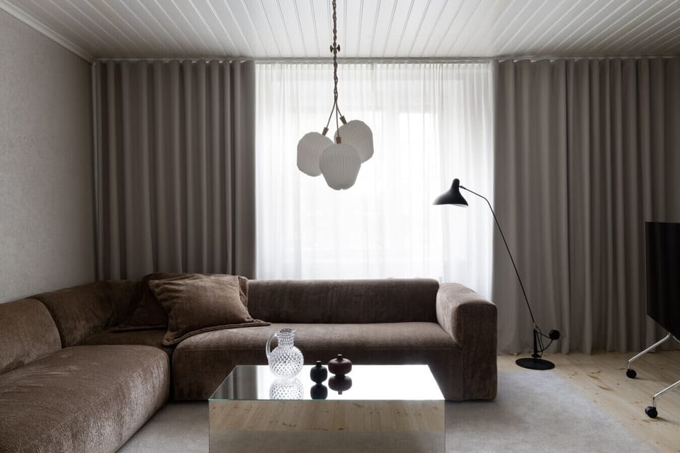 A large, comfortable sectional sofa invites you to unwind after a day of exploring.