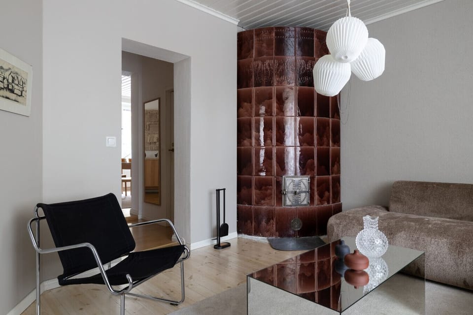 The living area features a beautiful fireplace, adding both style and comfort.