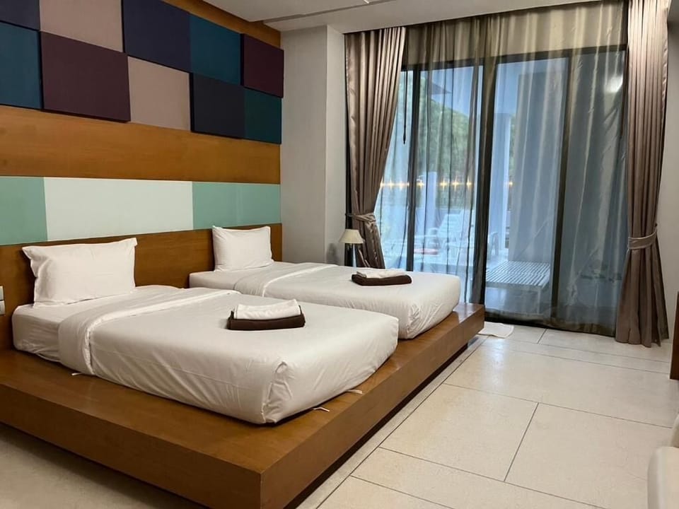 Deluxe Twin Room, Pool View | Free WiFi