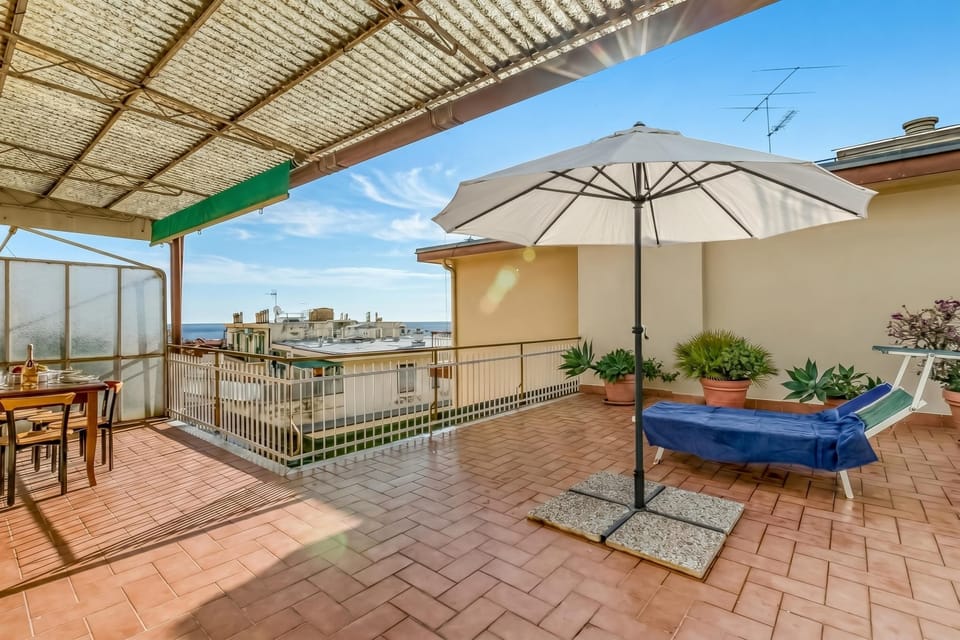 Family Apartment, 1 Bedroom, Balcony (Penthouse Vista Mare E Monti Centro) | Outdoor dining