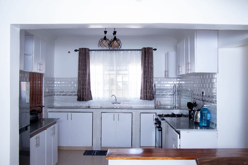 Family Bungalow, Garden View | Private kitchen | Fridge, microwave, electric kettle, cookware/dishes/utensils