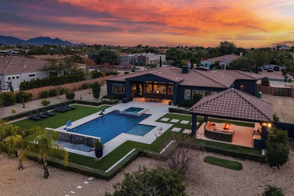 Escape to a property that has everything you want and more! This backyard is perfect for entertaining a family, with a private pool, hot tub, basketball court / pickleball court, putting green, and massive yard!