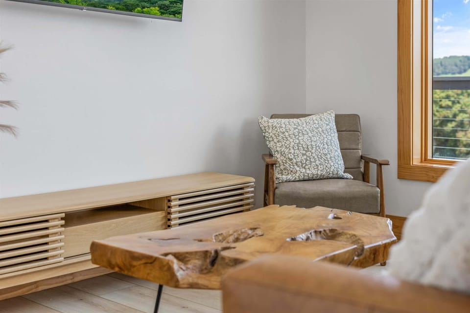 Chairs and a table arranged for comfortable use and relaxation.