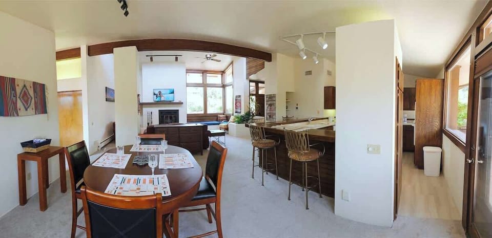 Dining area with table and seating for 4