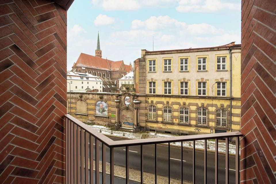 Balcony view overlooking charming historic architecture.