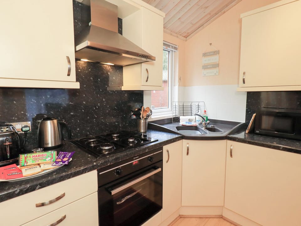 Fridge, microwave, cookware/dishes/utensils