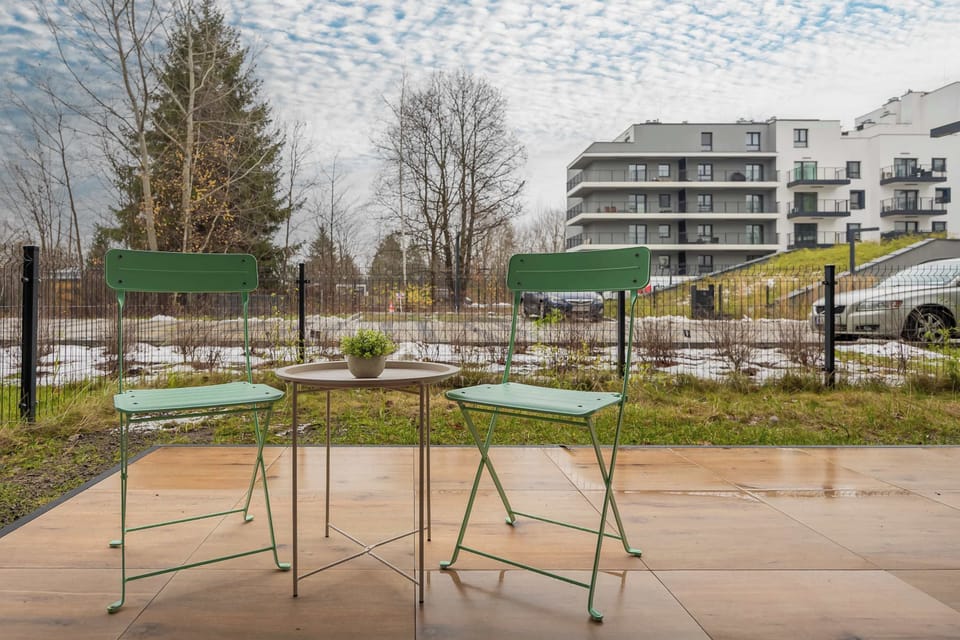The furnished garden provides a perfect spot for enjoying the fresh air.