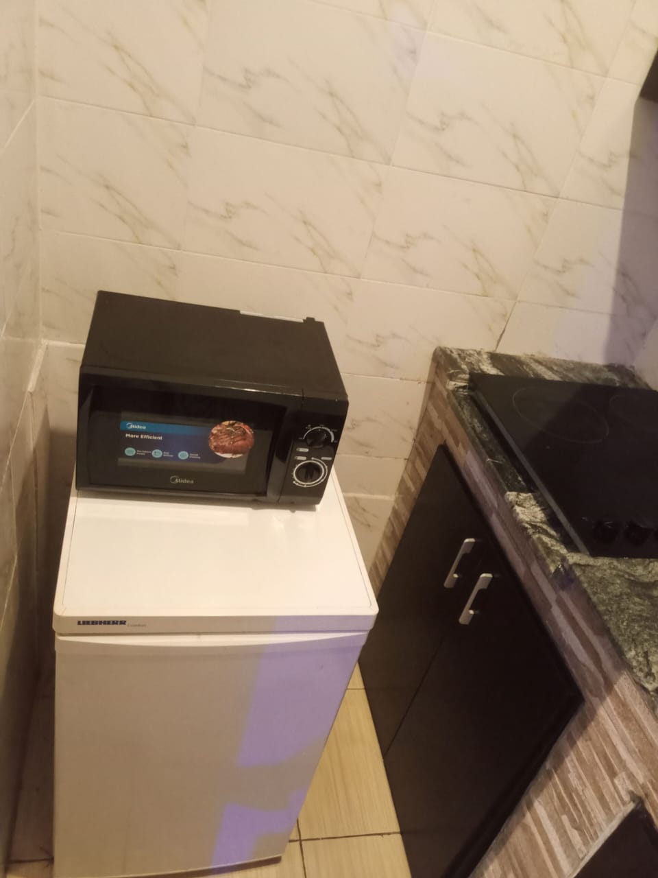 Grand Quadruple Room | Private kitchen | Mini-fridge