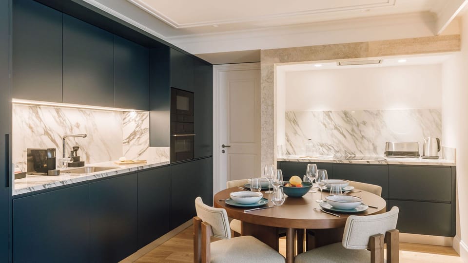 A contemporary kitchen with marble countertops — where beauty meets practicality.
 #AndoLiving #Portugal #Santos #MarbleVibes #ModernKitchen