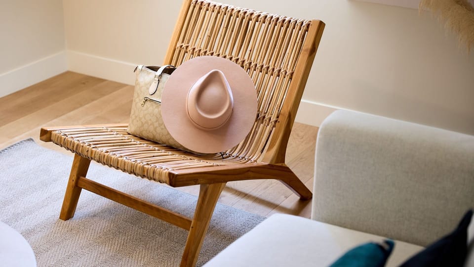 A sunlit corner with a comfortable reading chair for quiet, slow moments.

#ReadingCorner #SoftLight #SlowStay #CosyVibes