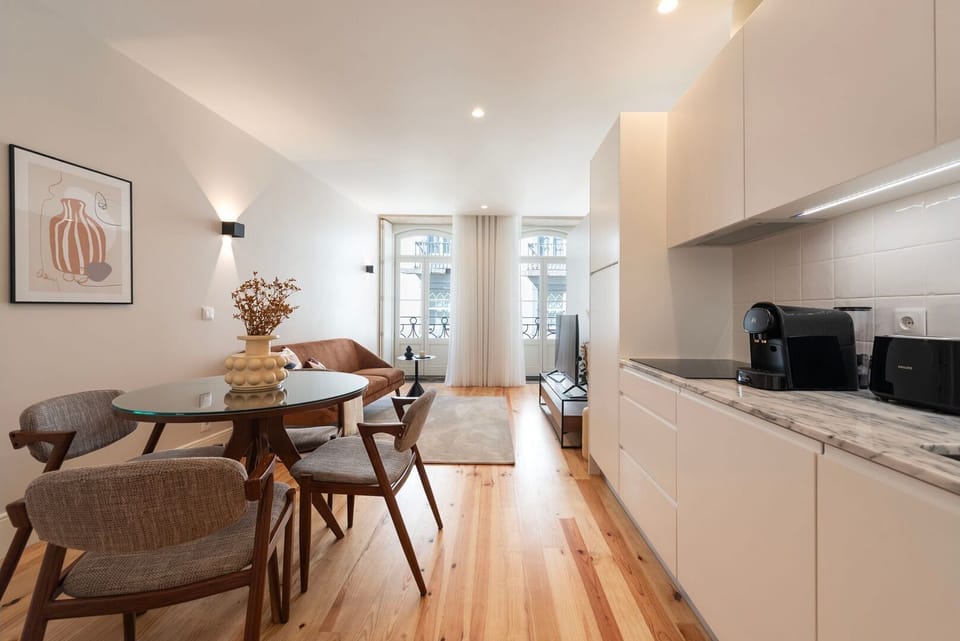 Whether you're lounging in the living room, sharing meals at the dining table, or preparing meals in the kitchen, this open-concept space is perfect for making unforgettable memories.