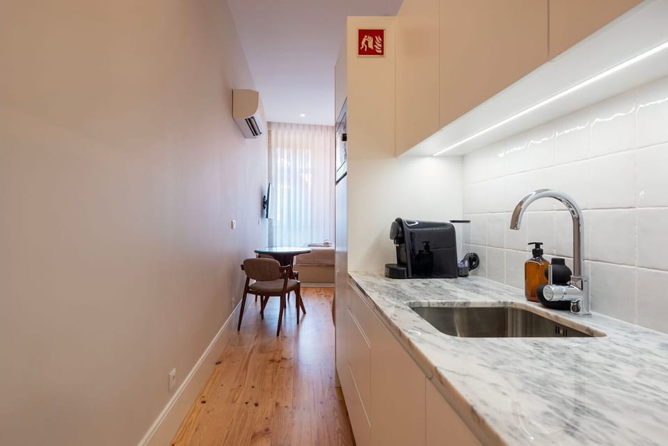 A compact yet fully equipped kitchenette, designed for efficient cooking with a modern, stylish touch.

#ModernKitchen #SmartDesign #FullyEquipped #UrbanLiving