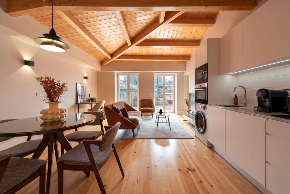 Whether you're lounging in the living room, sharing meals at the dining table, or preparing meals in the kitchen, this open-concept space is perfect for making unforgettable memories.