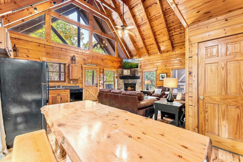 Rustic log dining table w/ ample seating for memorable meals!
