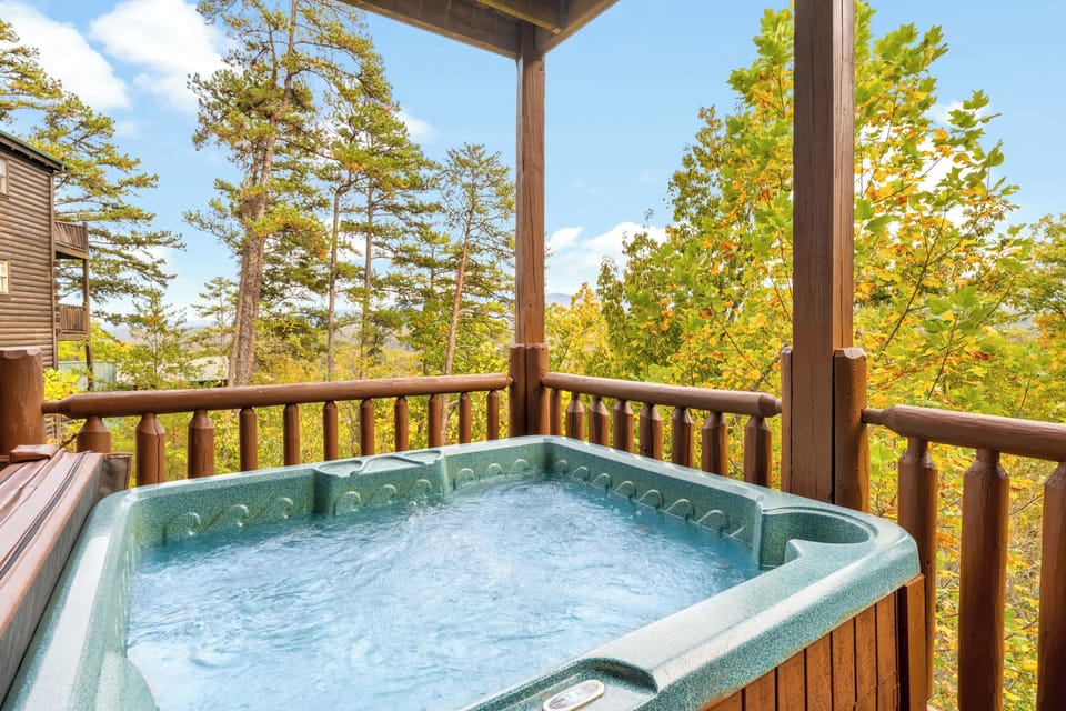 Relax in the hot tub or enjoy nature from rocking chairs!