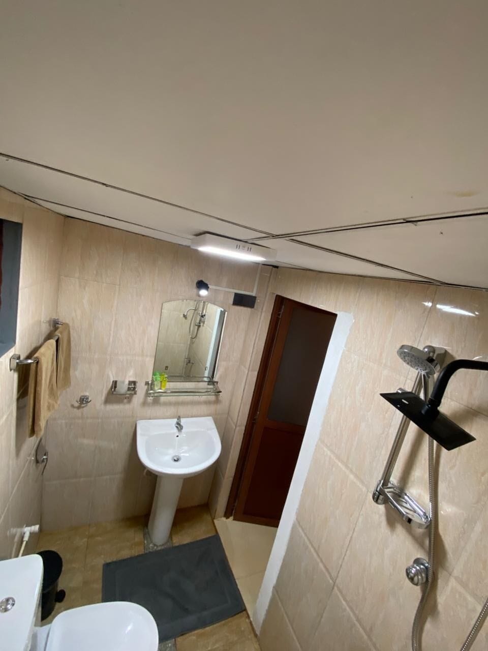 Deluxe Triple Room, Garden View | Bathroom | Bidet, soap, shampoo, toilet paper