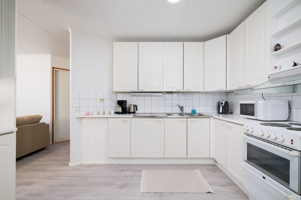 In the spacious kitchen you can find everything needed for preparing your own meals and a four-person dining table for mealtimes.