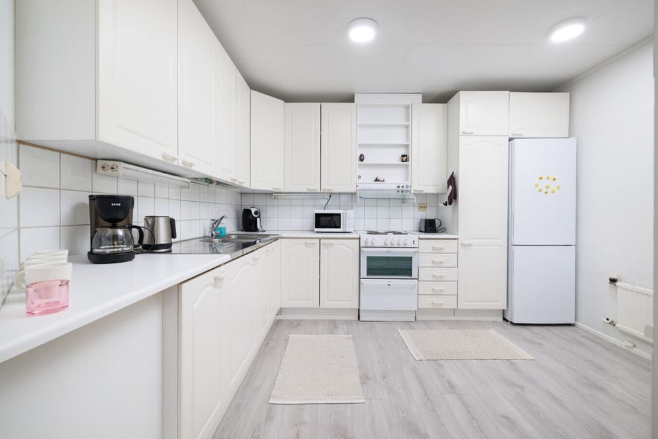 In the spacious kitchen you can find everything needed for preparing your own meals and a four-person dining table for mealtimes.