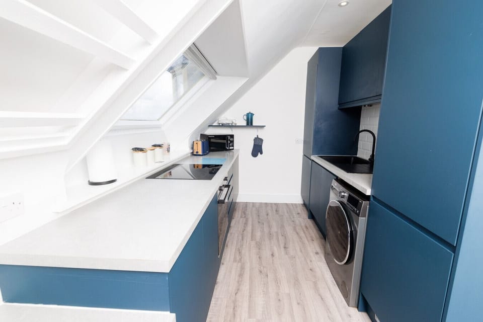 Kitchen area with skylight