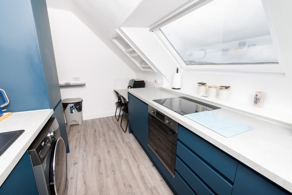 Kitchen area with skylight