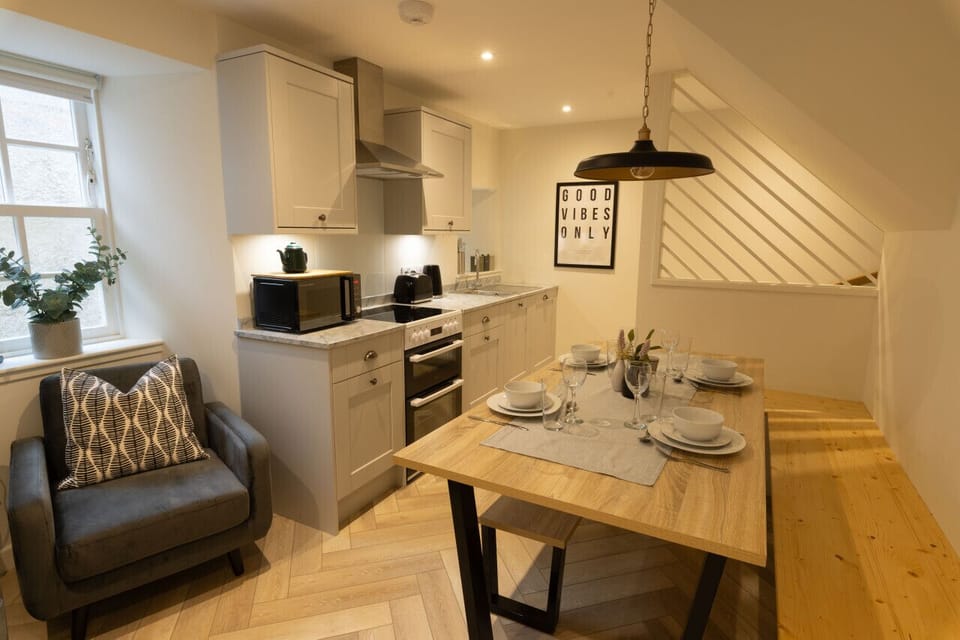 Modern well-equipped kitchen and dining space