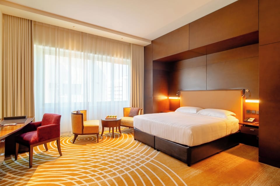 Deluxe Room, 1 King Bed | Minibar, in-room safe, desk, soundproofing