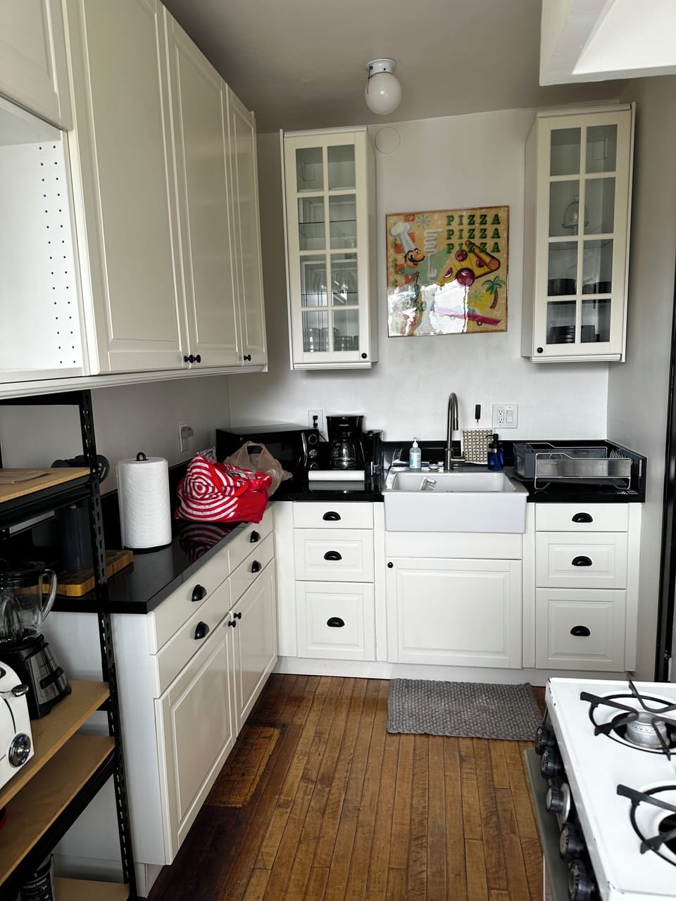 Kitchen with toaster over and espresso maker