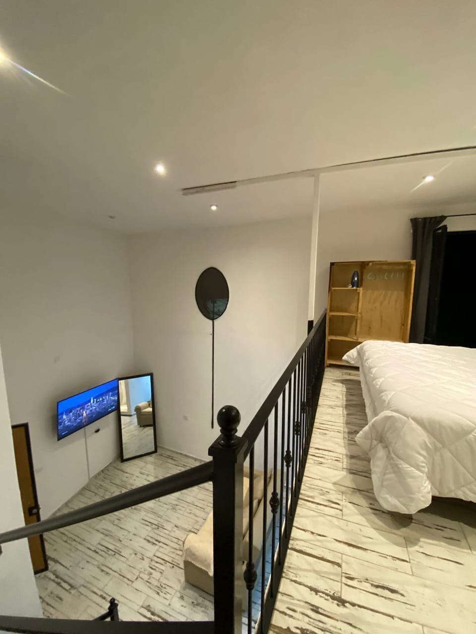 Grand Studio Suite, Balcony, City View | Living area | 40-inch Smart TV with digital channels