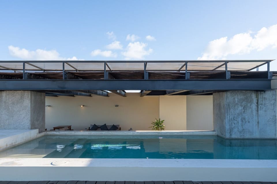 Rooftop pool with open views, perfect for relaxing under the sky.